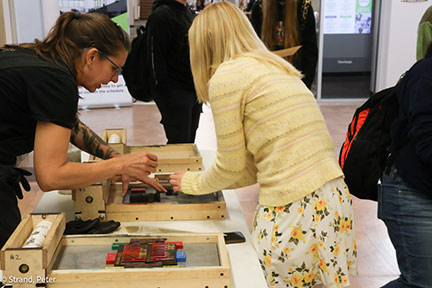 Jessica Helping Student with Letterpress project